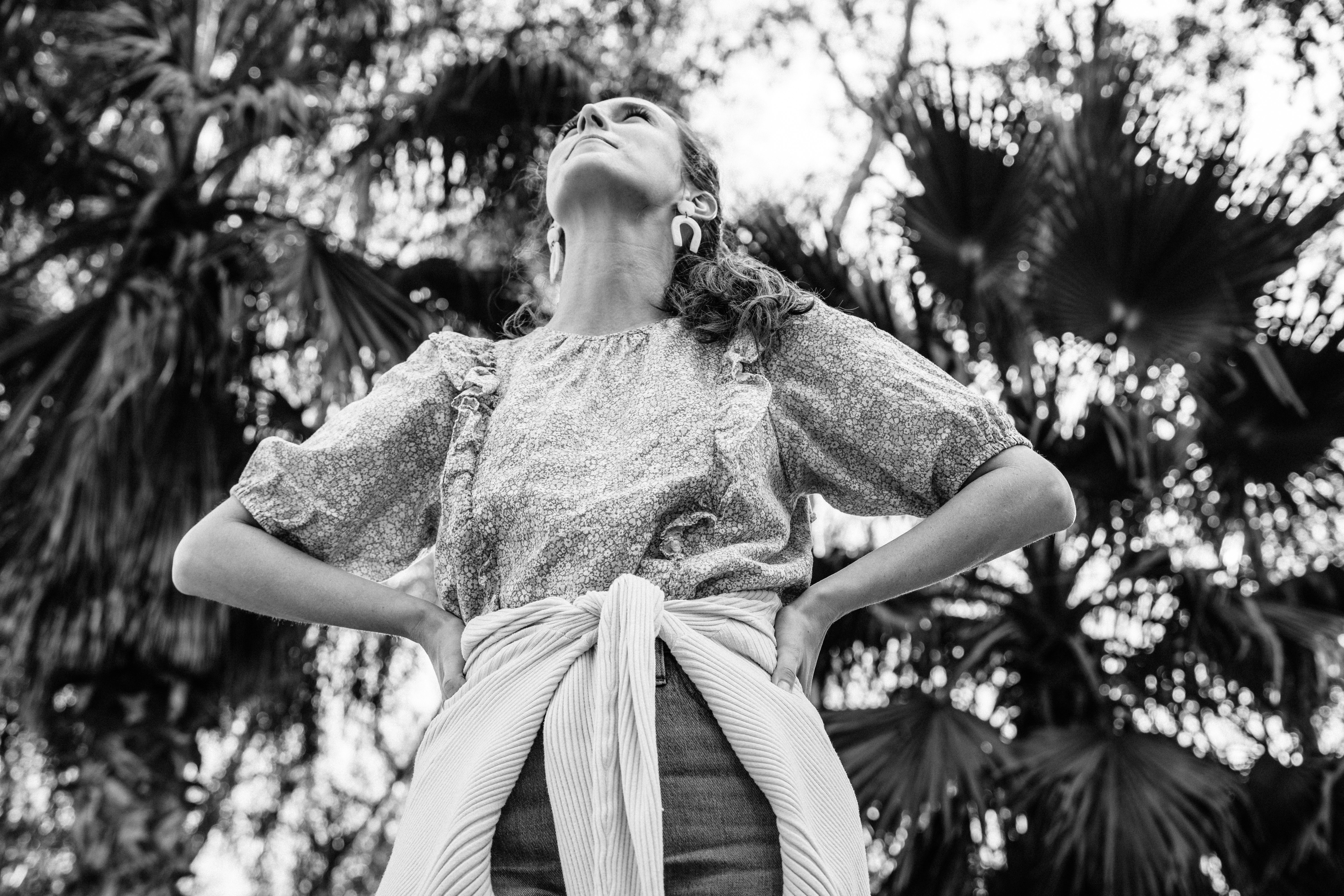 grayscale photo of woman in dress and scarf